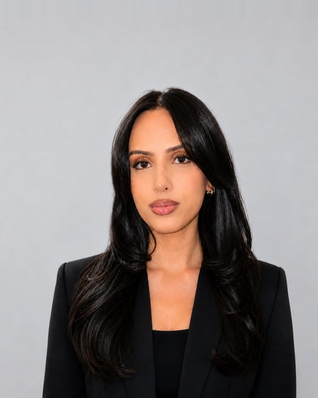 Portrait of Nayab Hassan, Co-Founder & Partner